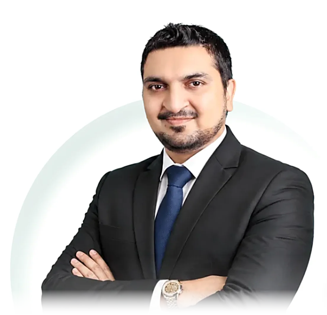 Zohaib Butt — leadership coach and corporate trainer, arms crossed and smiling